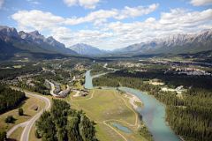 14 Canmore, Mount Rundle, Cascade Mountain As Helicopter From Lake Magog Prepares To Land In Canmore.jpg